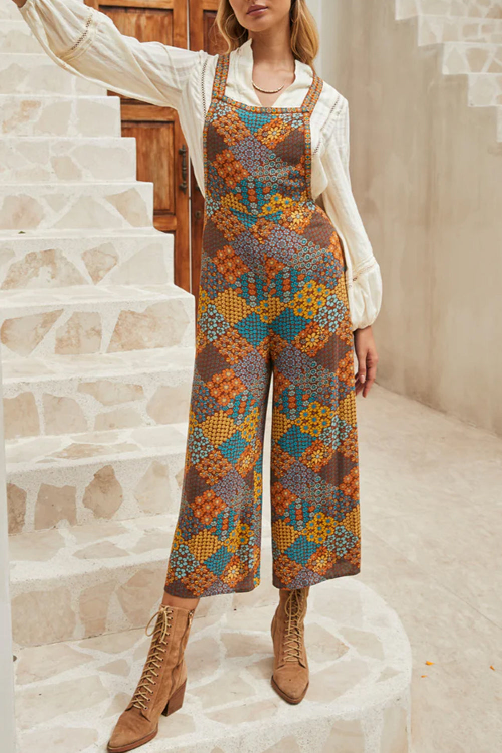 Addison® | Wide leg jumpsuit with cross straps and floral print